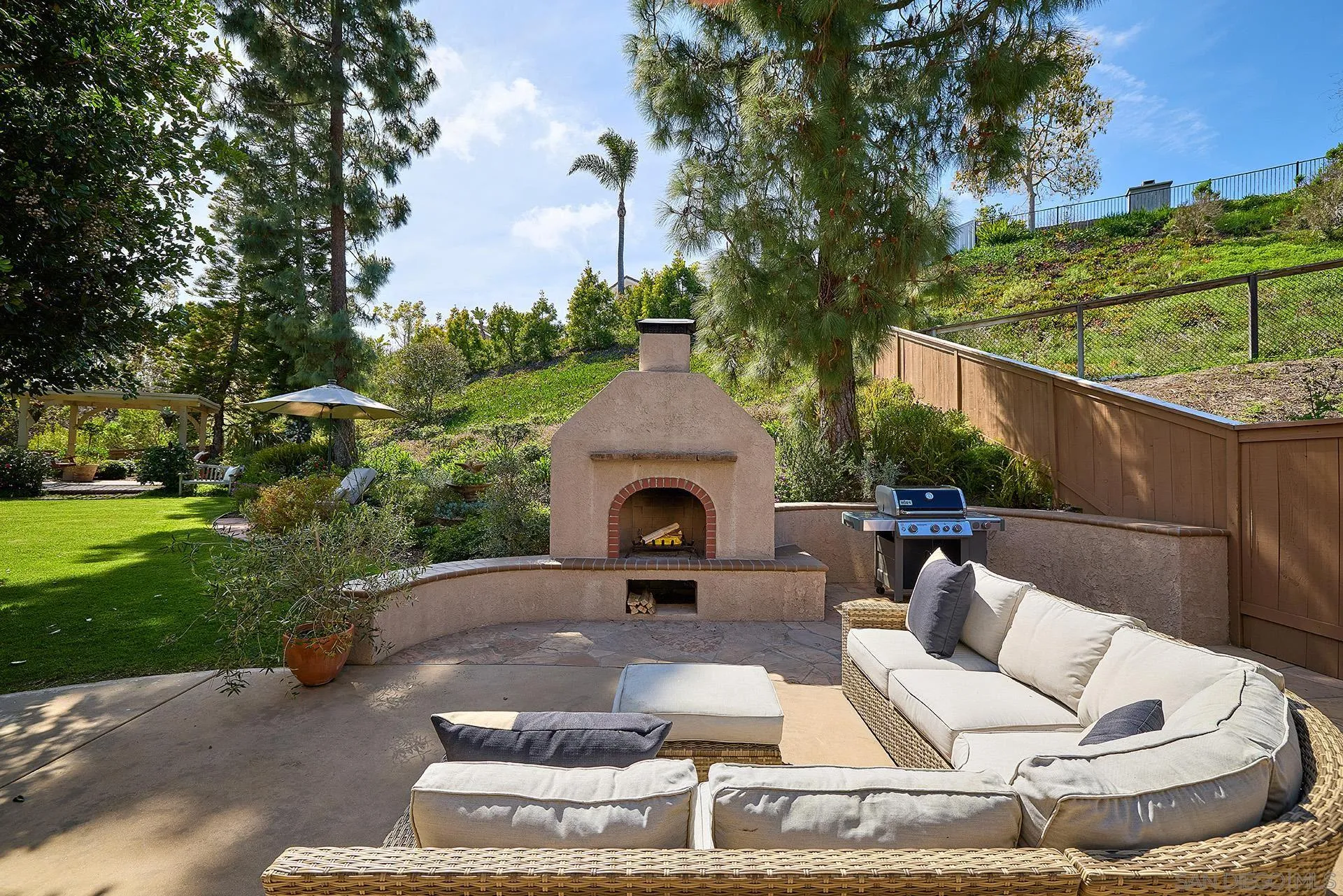 1229 Swallowtail Court Encinitas, CA 92024 - Photo 17 of 36 a view of a couches in the patio with a fire pit