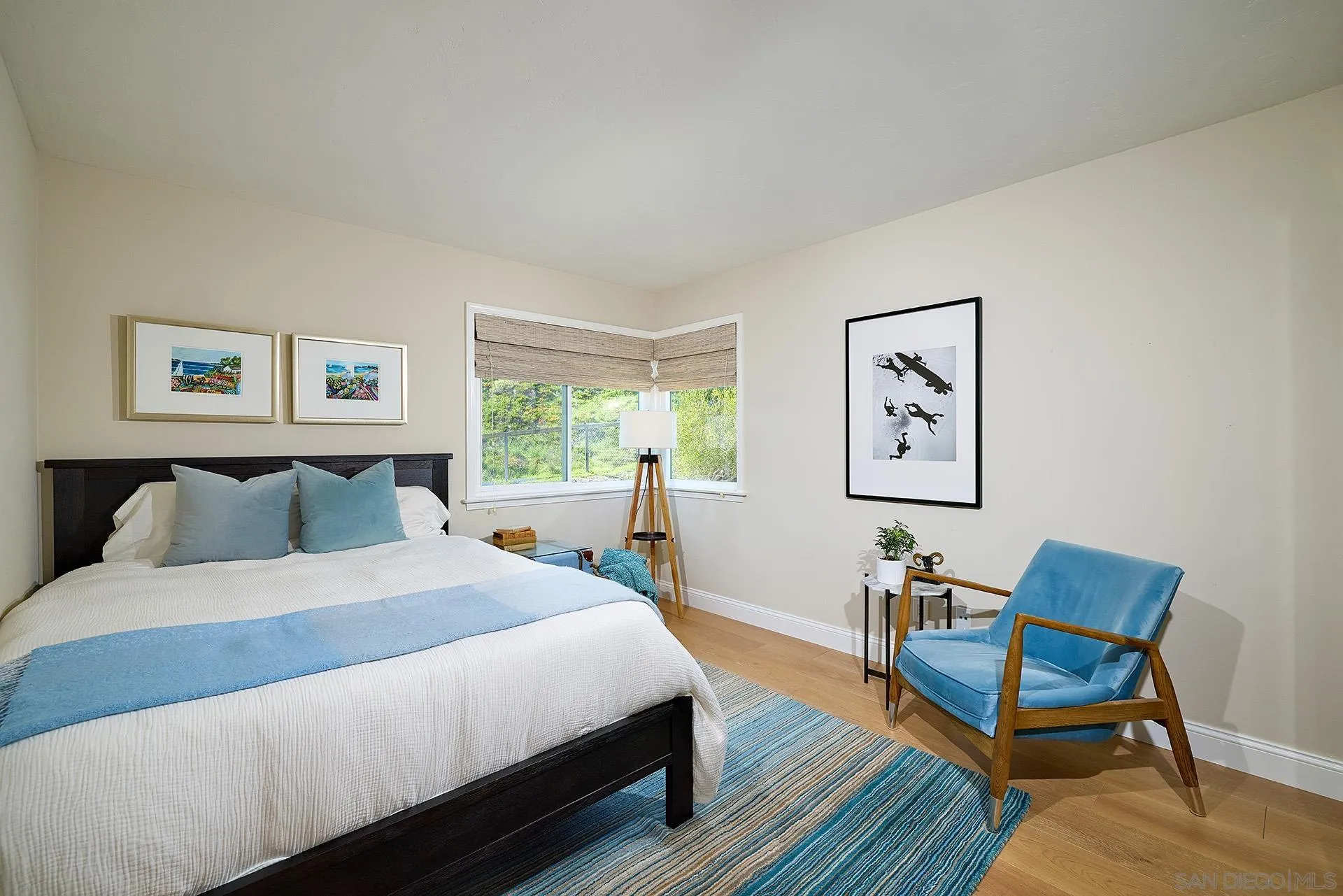 1229 Swallowtail Court Encinitas, CA 92024 - Photo 23 of 36 a bedroom with a bed a table and chair