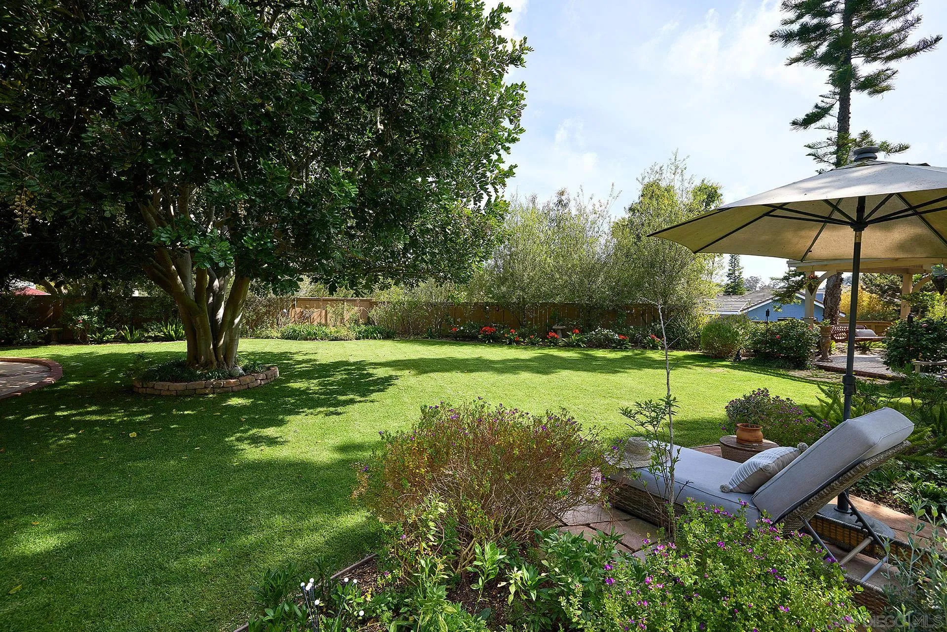 1229 Swallowtail Court Encinitas, CA 92024 - Photo 27 of 36 a view of a garden with an outdoor space