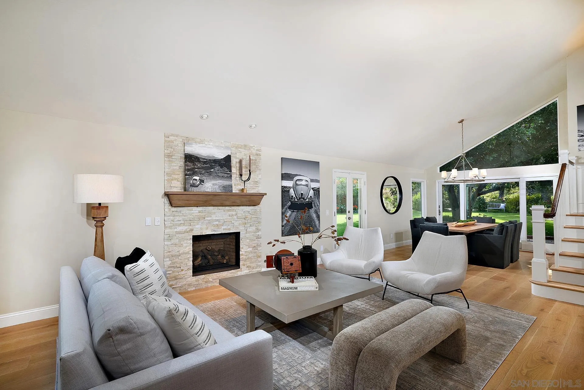 1229 Swallowtail Court Encinitas, CA 92024 - Photo 3 of 36 a living room with furniture fireplace and window