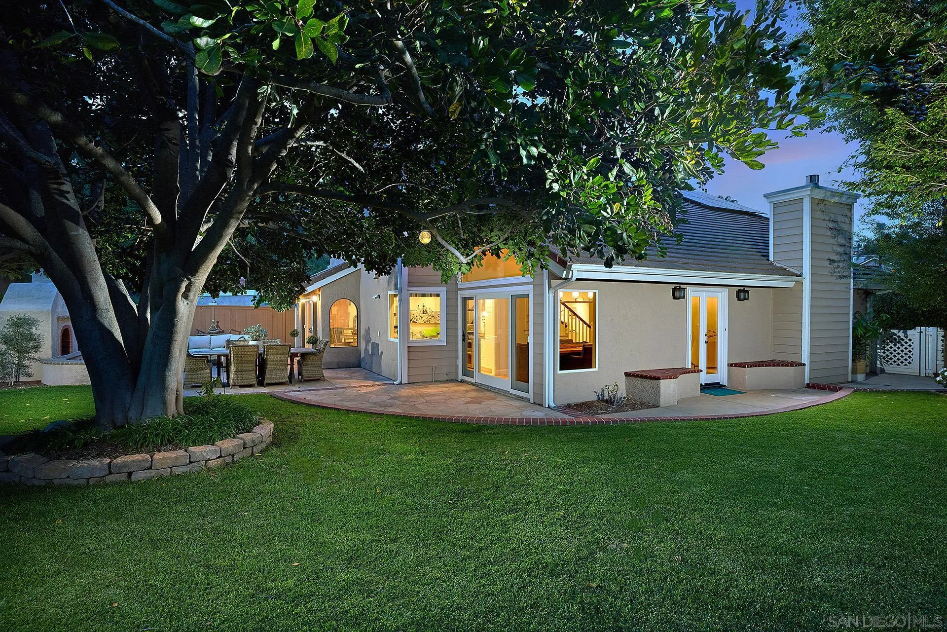 1229 Swallowtail Court Encinitas, CA 92024 - Photo 34 of 36 a house view with a sitting space and garden