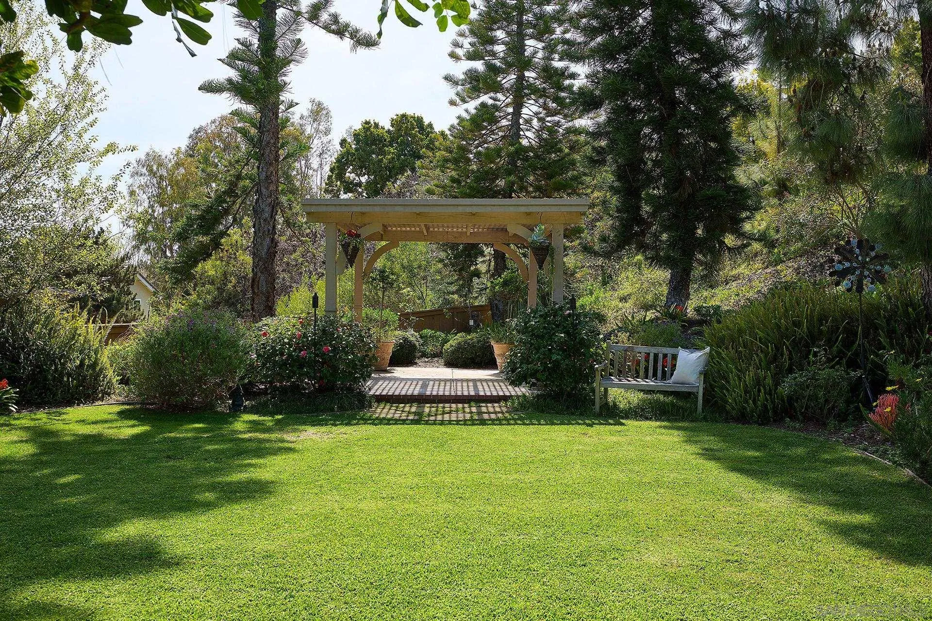 1229 Swallowtail Court Encinitas, CA 92024 - Photo 6 of 36 a view of a house with backyard and sitting area
