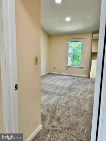 a bathroom with a shower and a toilet