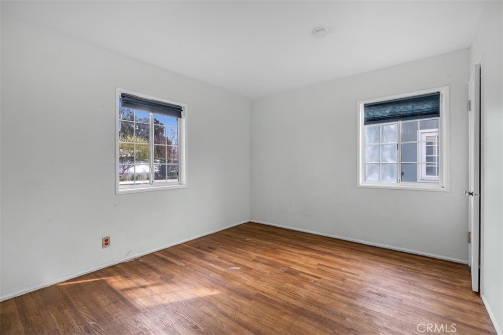 1625 North Maple Street Burbank, CA 91505 - Photo 16 of 30 a view of an empty room with wooden floor and a window