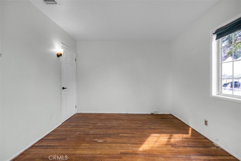 1625 North Maple Street Burbank, CA 91505 - Photo 17 of 30 a view of a room with wooden floor and window