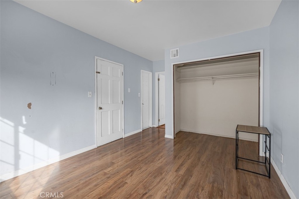 1625 North Maple Street Burbank, CA 91505 - Photo 20 of 30 a view of an empty room with wooden floor