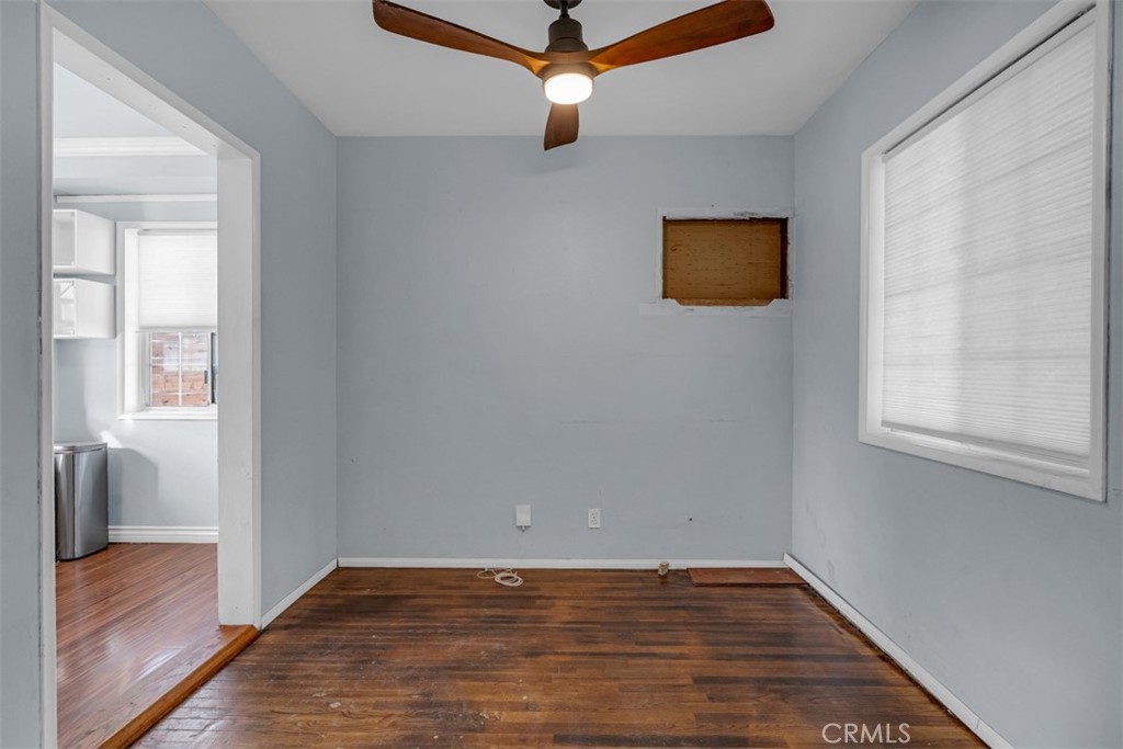 1625 North Maple Street Burbank, CA 91505 - Photo 7 of 30 a view of an empty room with wooden floor and a window