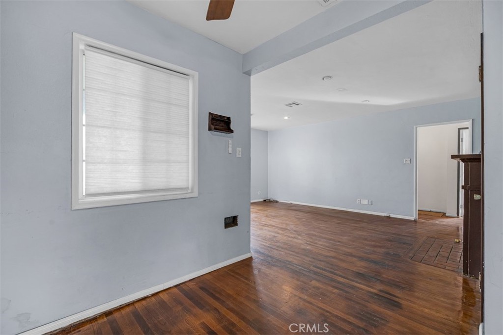 1625 North Maple Street Burbank, CA 91505 - Photo 8 of 30 an empty room with wooden floor and windows