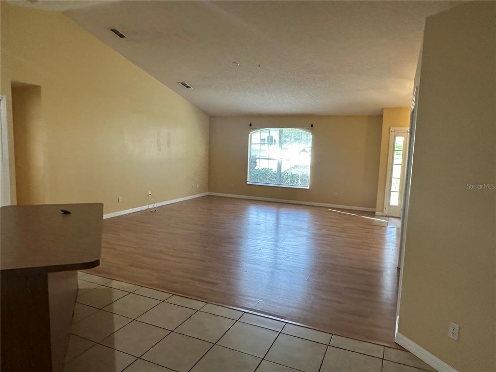 1105 Hill Mount Drive Minneola, FL 34715 - Photo 6 of 12 an empty room with windows