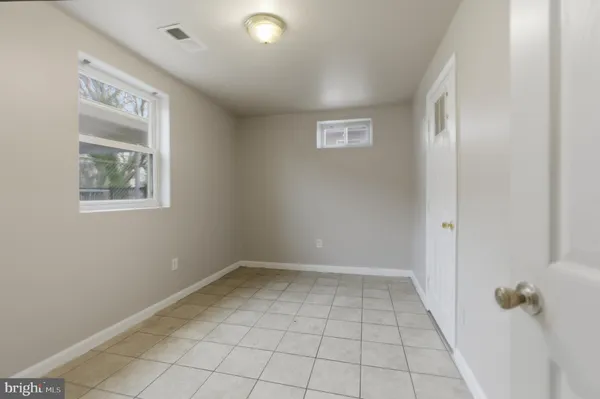 a view of a hallway with closet area