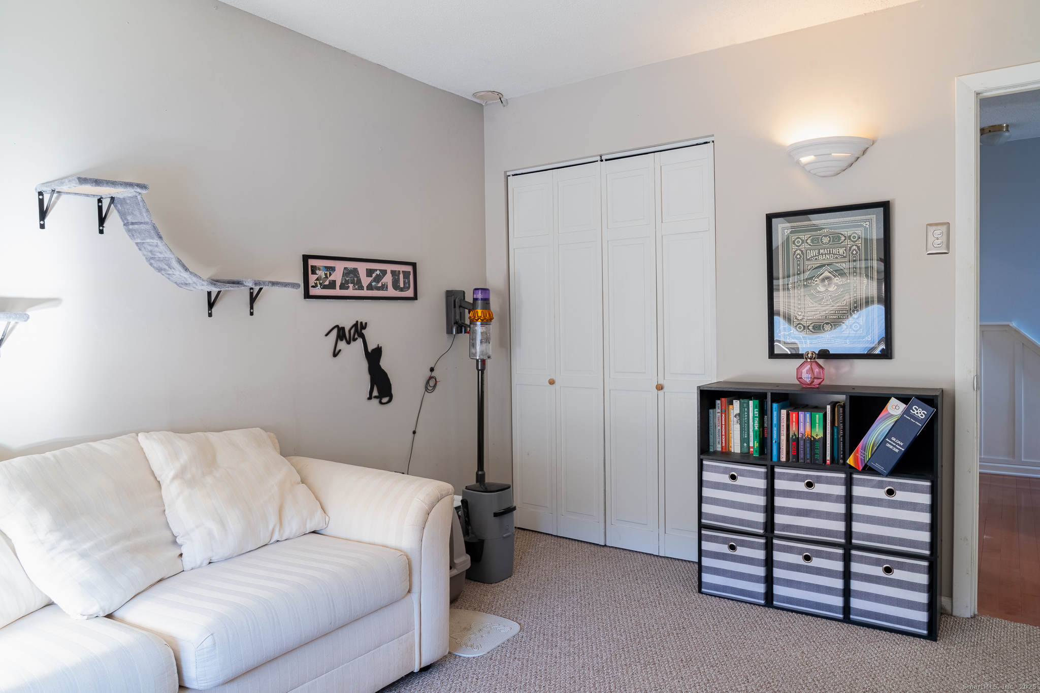 238 Shagbark Drive, Unit 238 Derby, CT 06418 - Photo 16 of 25 a living room with furniture and baby crib