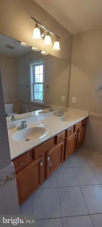 an empty room with a empty space and a window