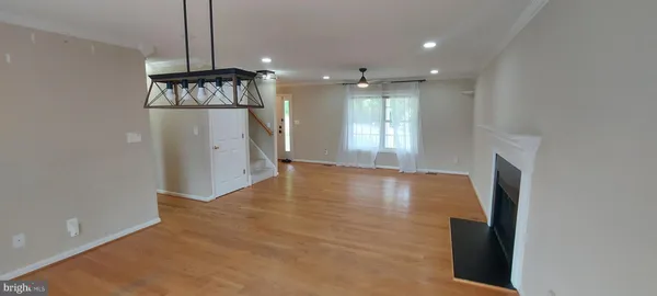 a view of entryway with wooden floor