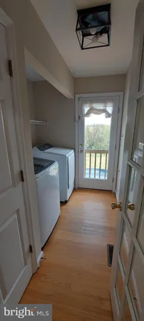 a kitchen with stainless steel appliances a refrigerator sink and cabinets