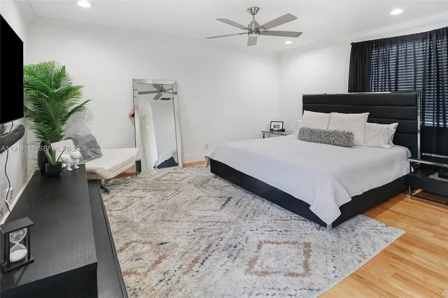 a view of entryway with wooden floor and stairs