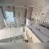 a view of a bathroom with shower