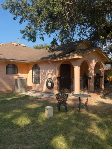 a front view of a house with yard