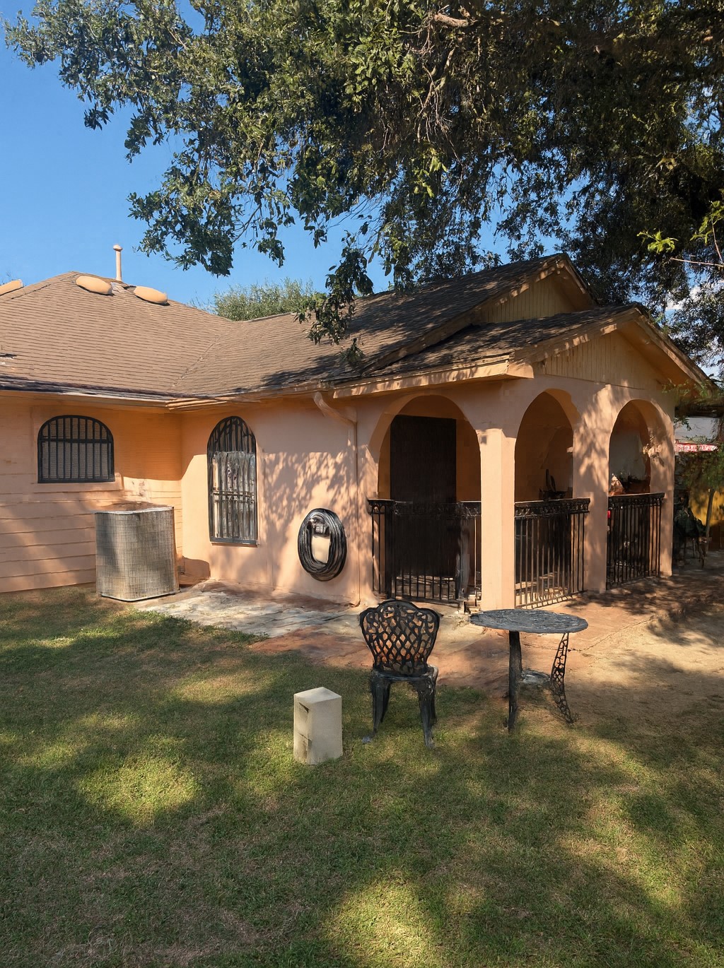 3335 Bandell Drive Houston, TX 77045 - Photo 14 of 16 a front view of a house with yard