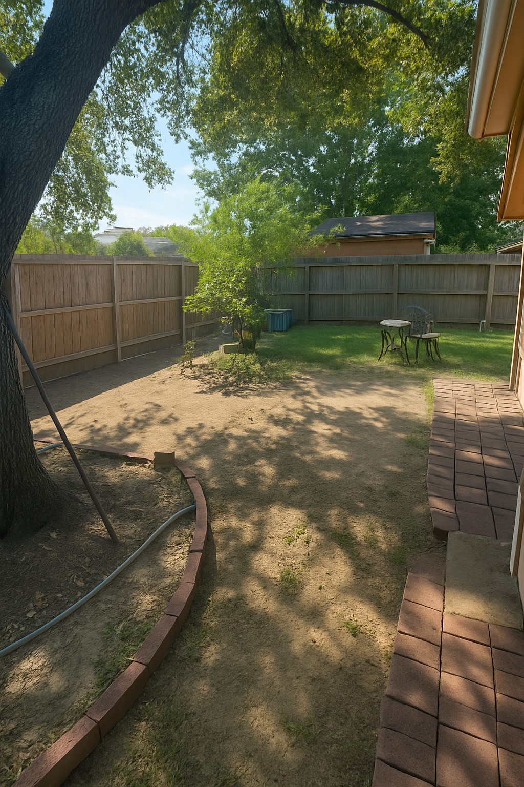 3335 Bandell Drive Houston, TX 77045 - Photo 16 of 16 a backyard of a house with lots of green space
