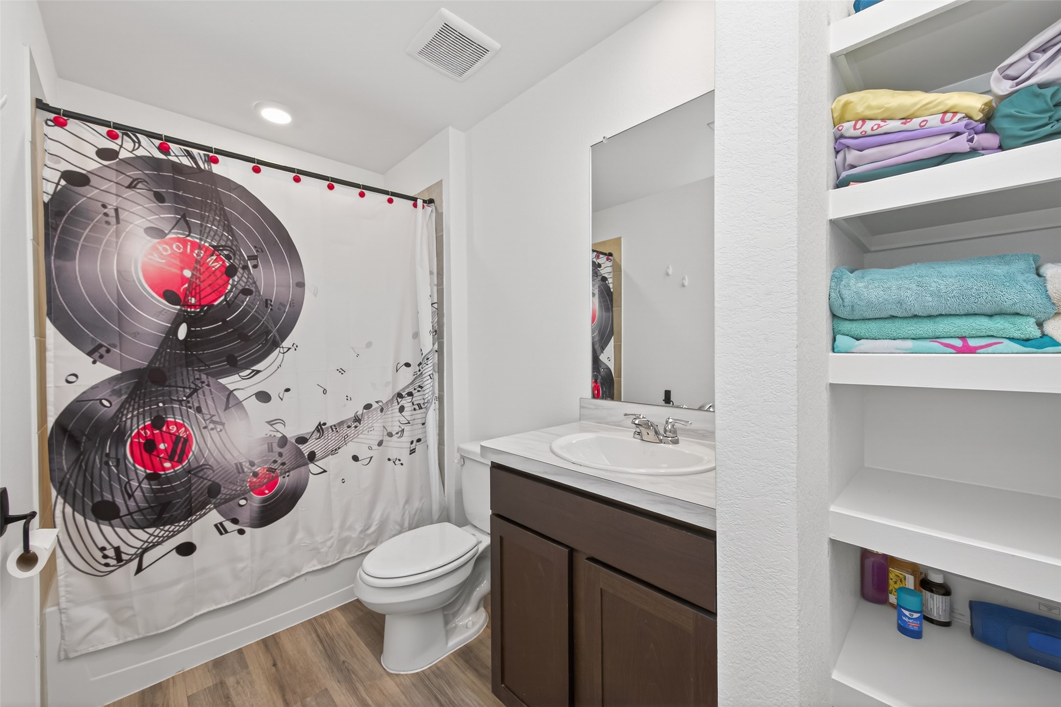 23532 Nectar Crest Heights Splendora, TX 77372 - Photo 18 of 21 a bathroom with a sink mirror and toilet