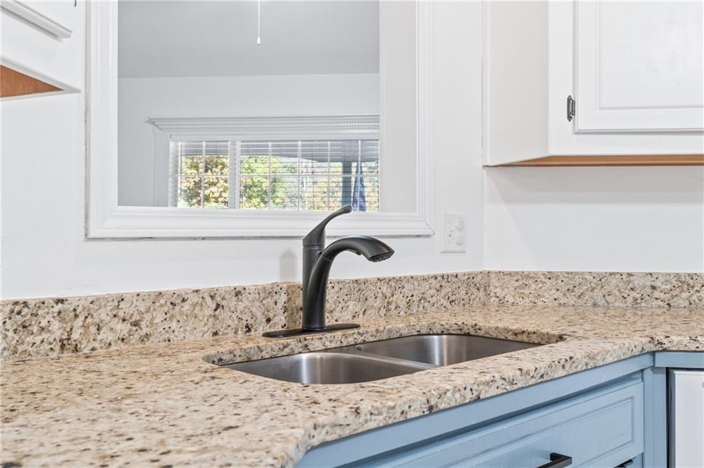 204 Red Fox Court Canton, GA 30114 - Photo 16 of 51 a close view of sink and tap