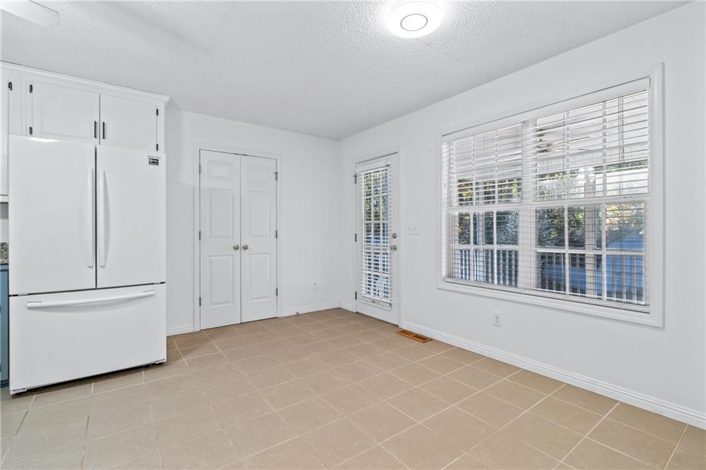 204 Red Fox Court Canton, GA 30114 - Photo 19 of 51 a view of an empty room with a window