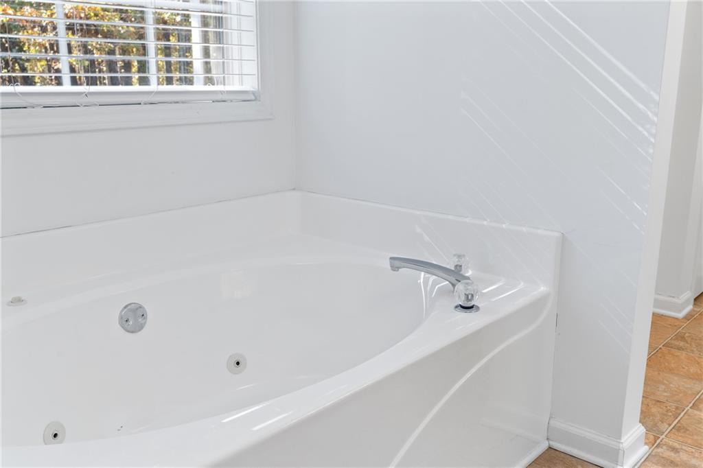 204 Red Fox Court Canton, GA 30114 - Photo 28 of 51 a view of a bathtub in a bathroom