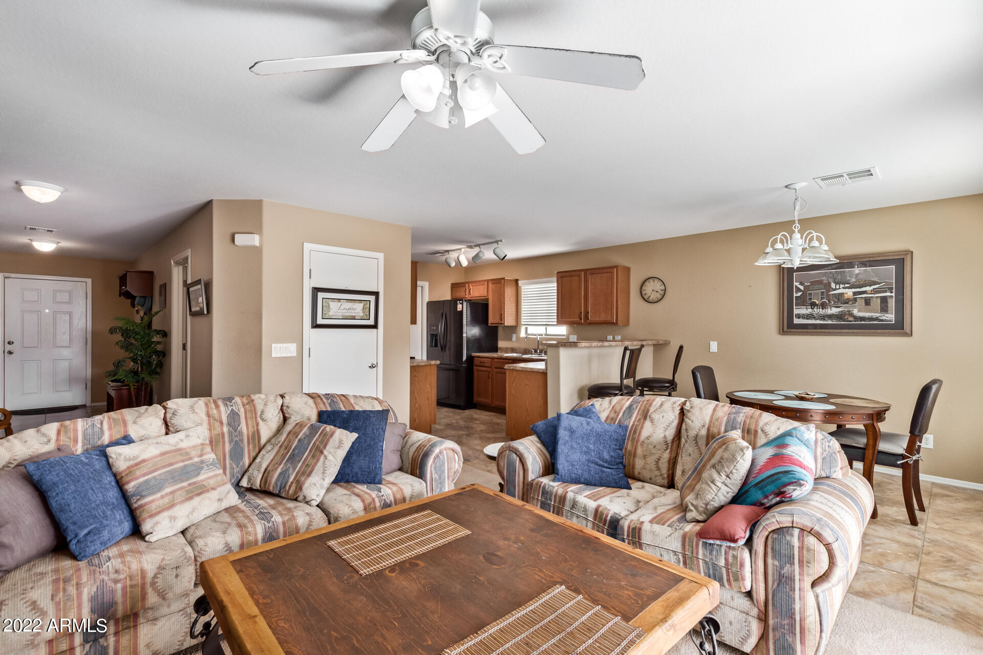 2742 South Powell Road Apache Junction, AZ 85119 - Photo 13 of 34 a living room with furniture and a view