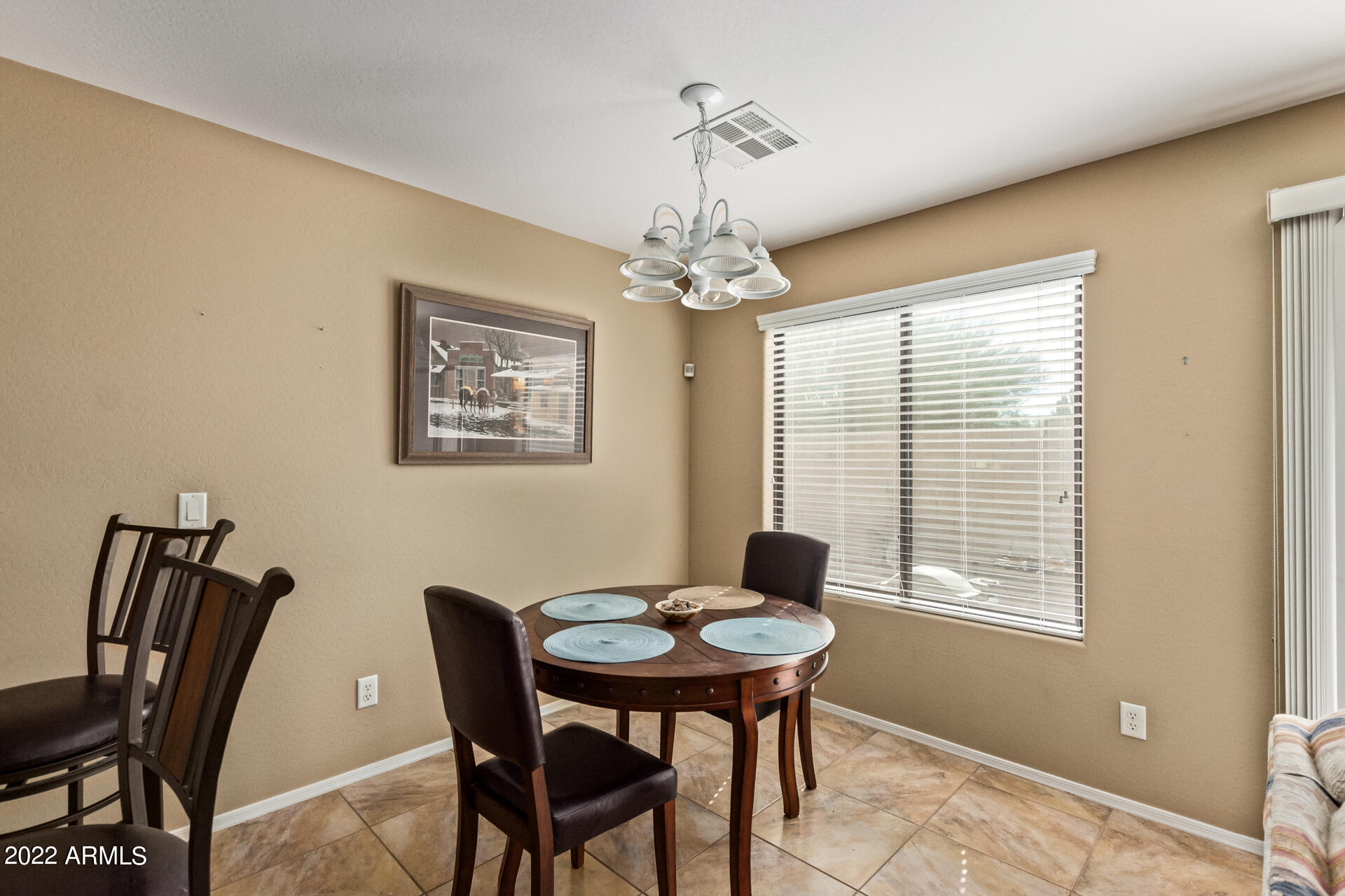 2742 South Powell Road Apache Junction, AZ 85119 - Photo 14 of 34 a view of a dining room with furniture window and outside view