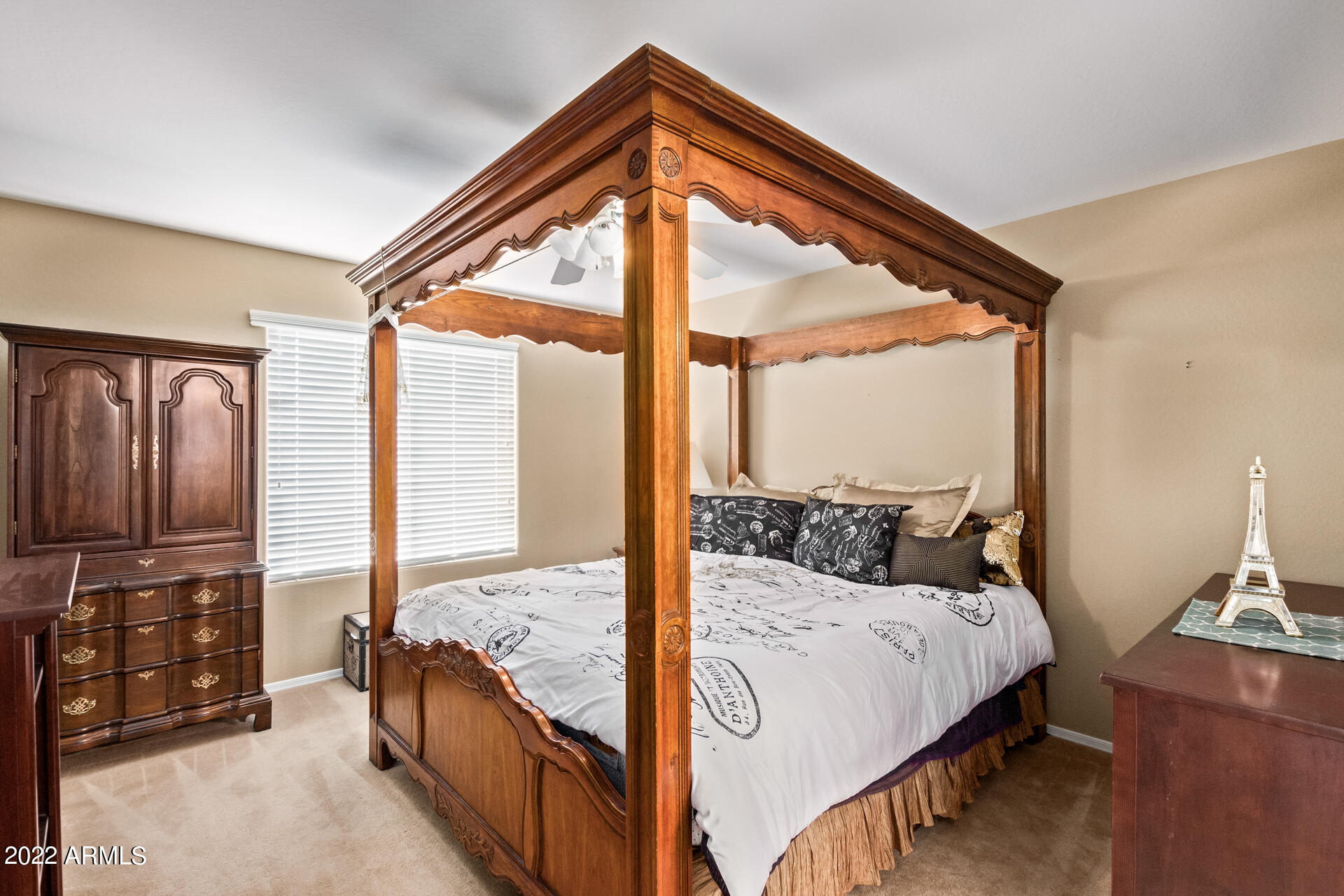 2742 South Powell Road Apache Junction, AZ 85119 - Photo 19 of 34 a bedroom with a large bed and a balcony view