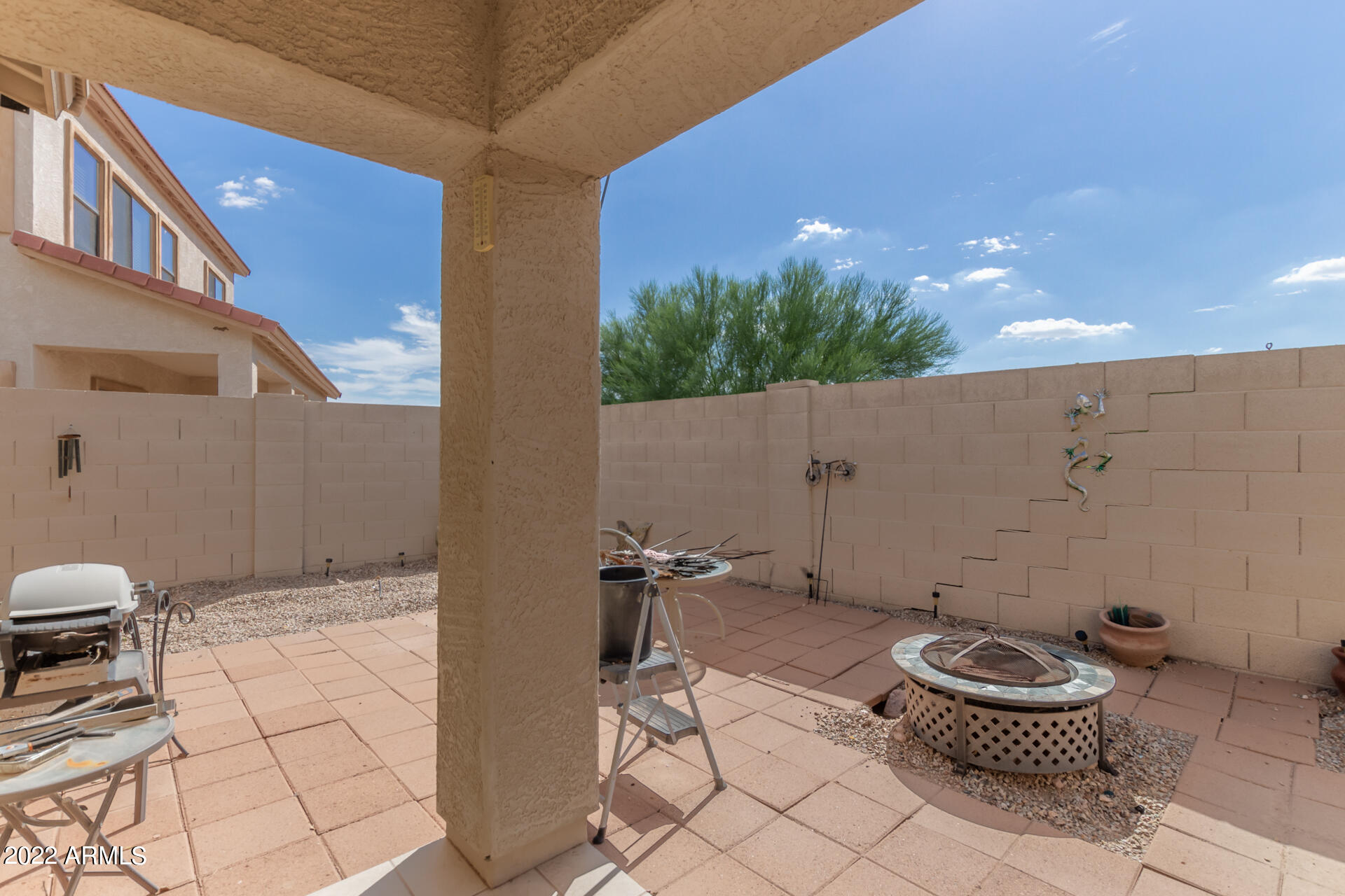 2742 South Powell Road Apache Junction, AZ 85119 - Photo 29 of 34 a bathroom with a toilet a sink and a mirror