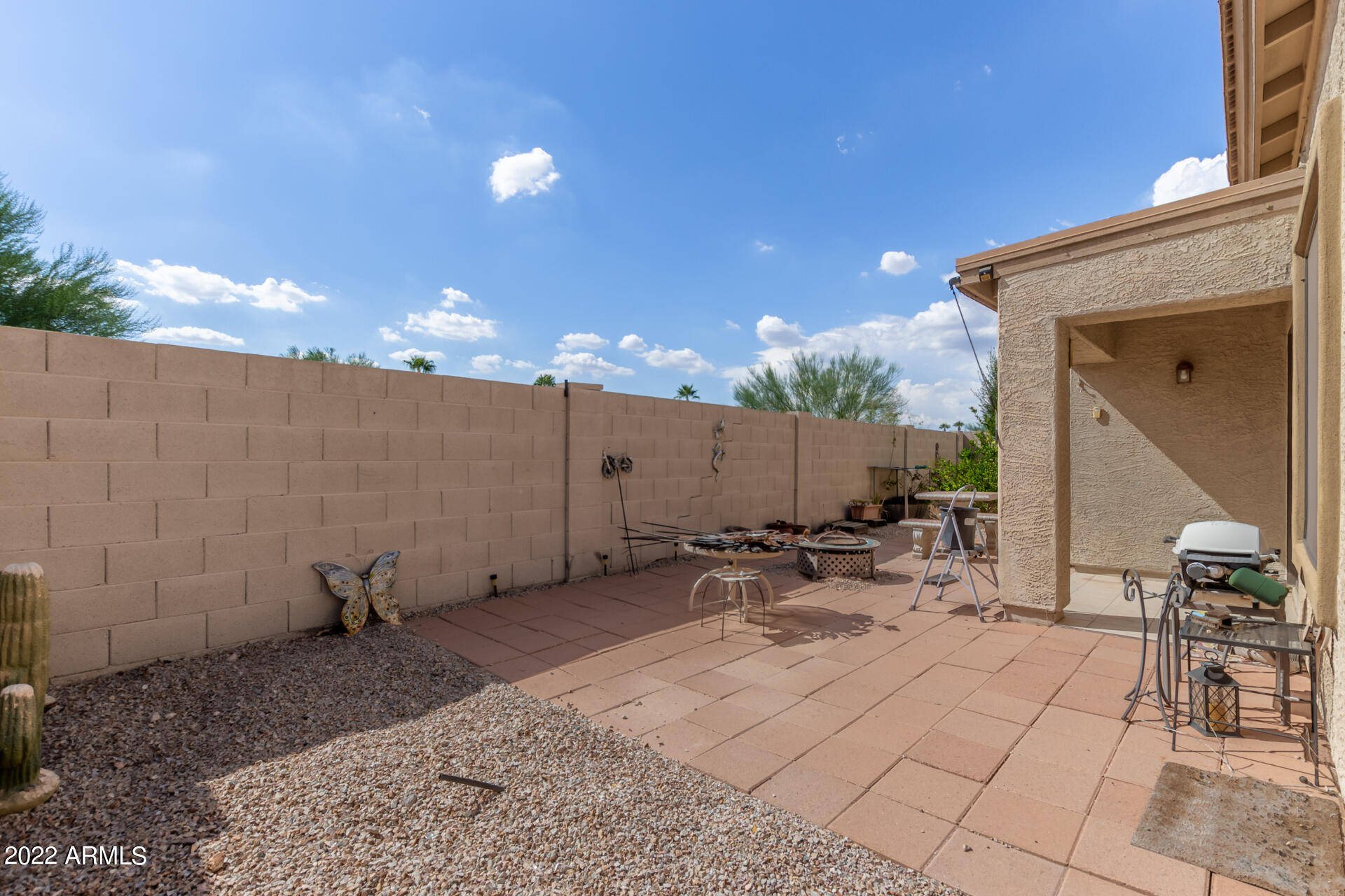 2742 South Powell Road Apache Junction, AZ 85119 - Photo 30 of 34 a view of a backyard with sitting area