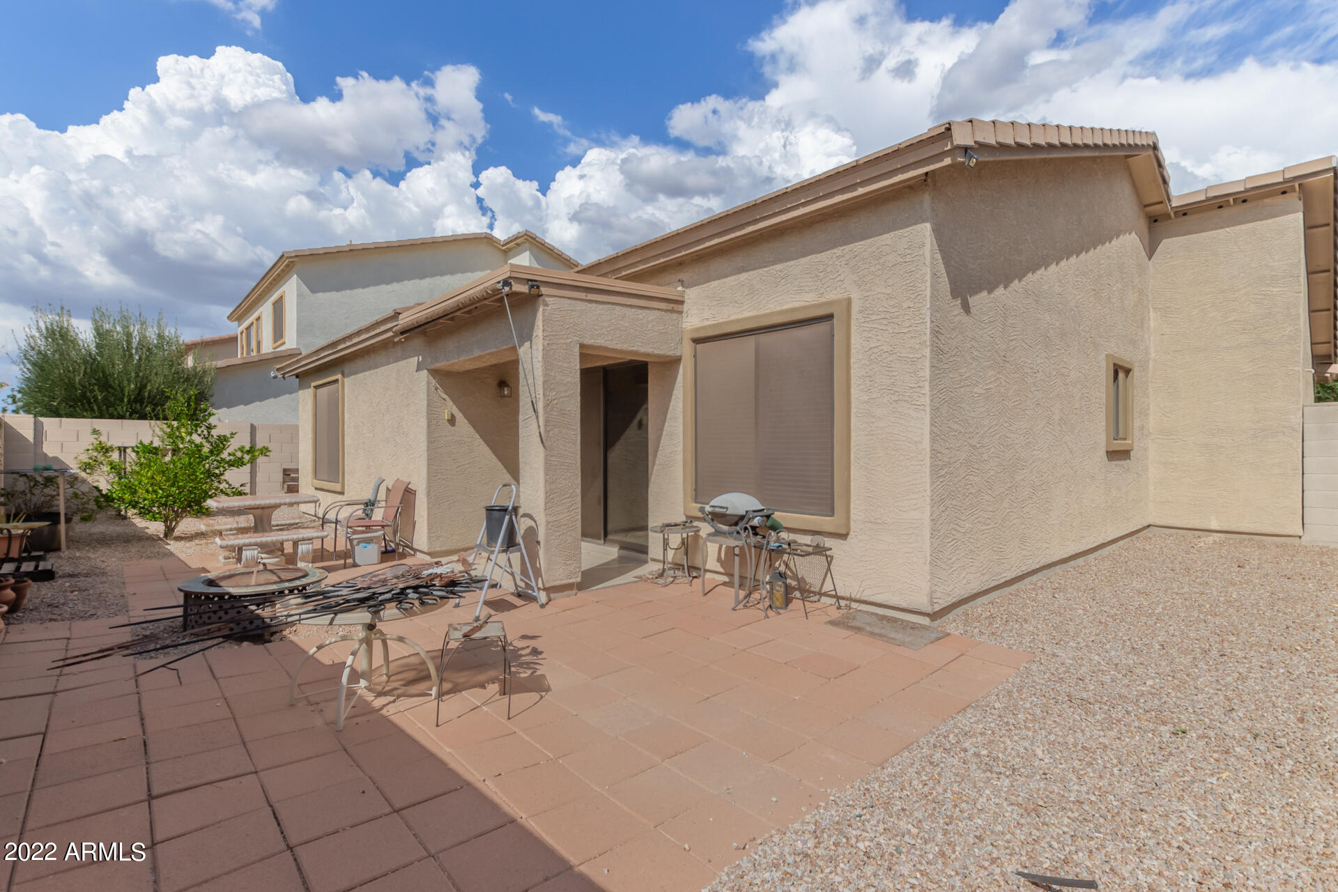 2742 South Powell Road Apache Junction, AZ 85119 - Photo 31 of 34 a view of a dinning table and chairs in the patio