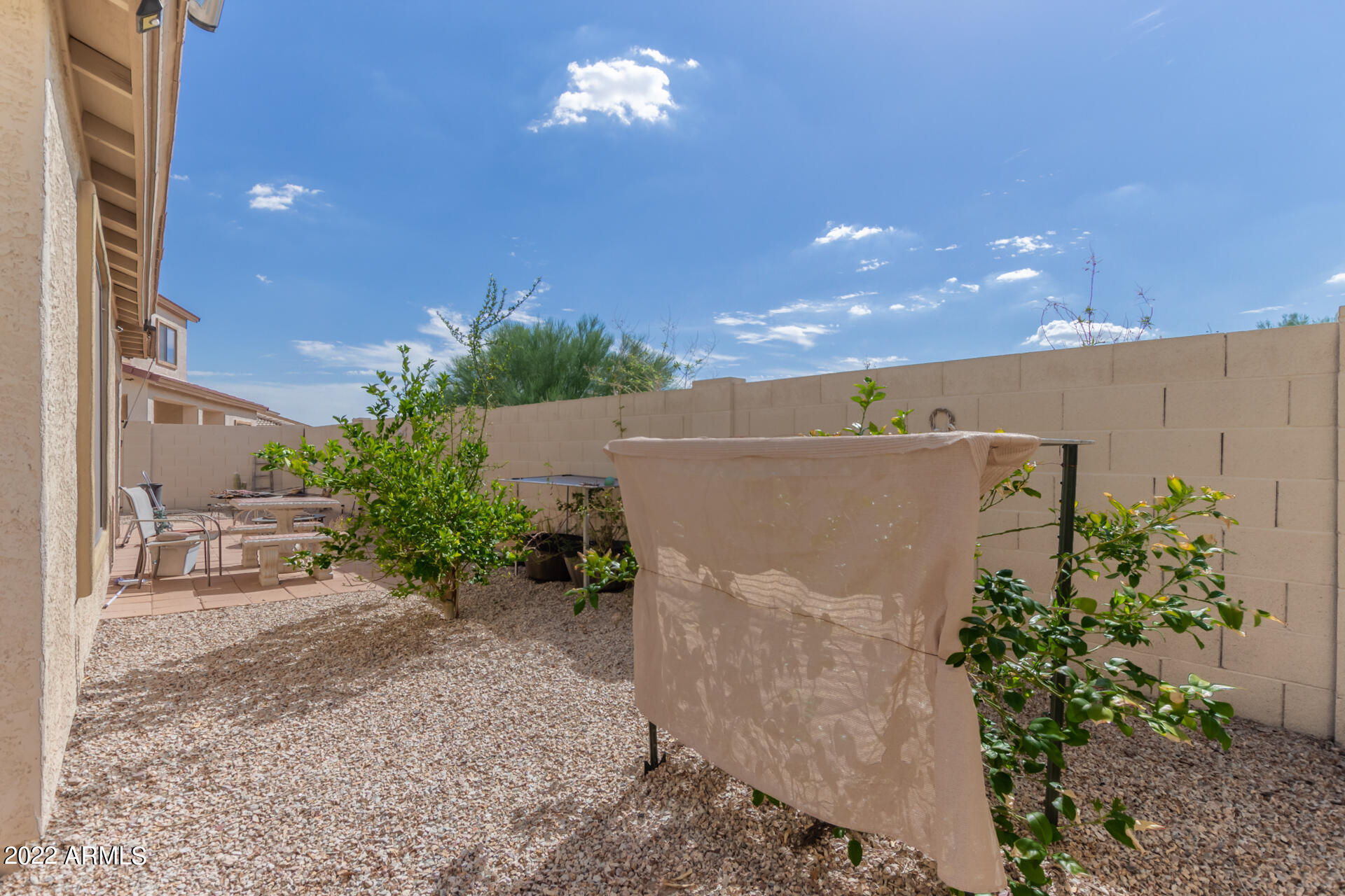 2742 South Powell Road Apache Junction, AZ 85119 - Photo 33 of 34 front view of a house with a yard