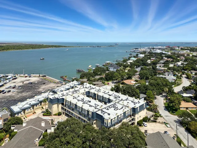 an aerial view of beach and ocean