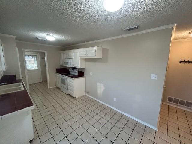 422 South 4th Street Wylie, TX 75098 - Photo 11 of 22 a bedroom with a bed and a view of kitchen