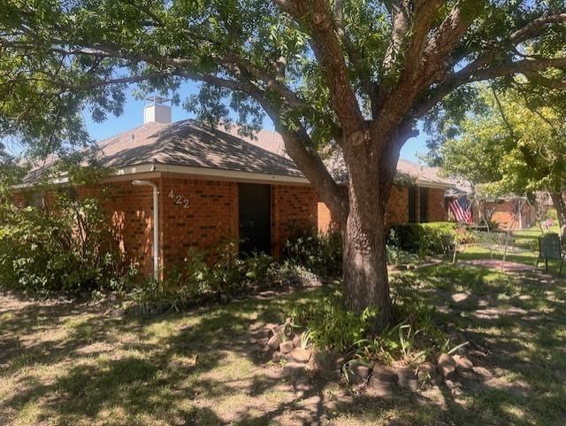 422 South 4th Street Wylie, TX 75098 - Photo 2 of 22 a view of a house with a tree in the yard