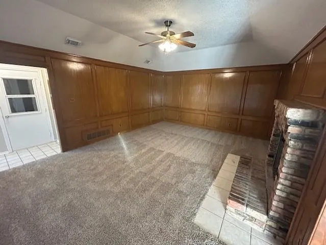 a view of a livingroom with a ceiling fan