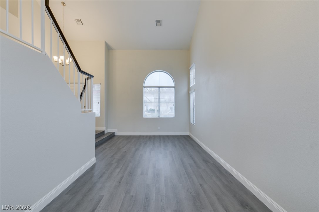 1738 Toltec Circle Henderson, NV 89014 - Photo 24 of 46 Natural light floods this room, highlighting the clean lines and modern flooring.