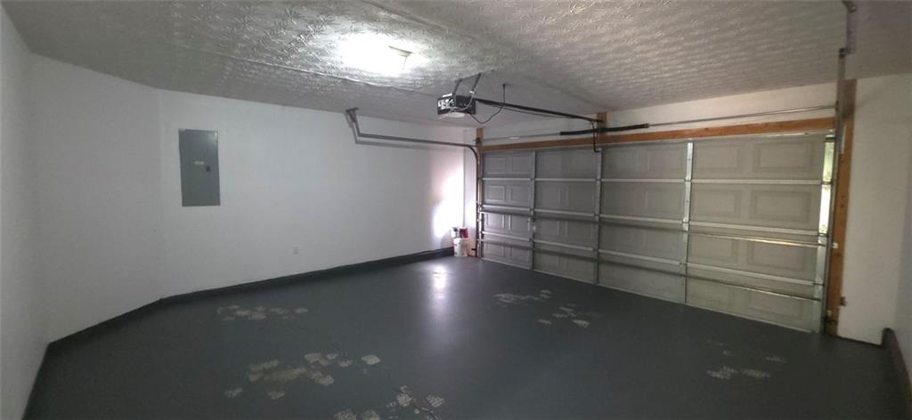 465 Little Creek Road Southeast Lawrenceville, GA 30045 - Photo 13 of 13 a view of a room with racks on the wall
