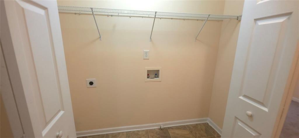 465 Little Creek Road Southeast Lawrenceville, GA 30045 - Photo 6 of 13 a bathroom with a shower