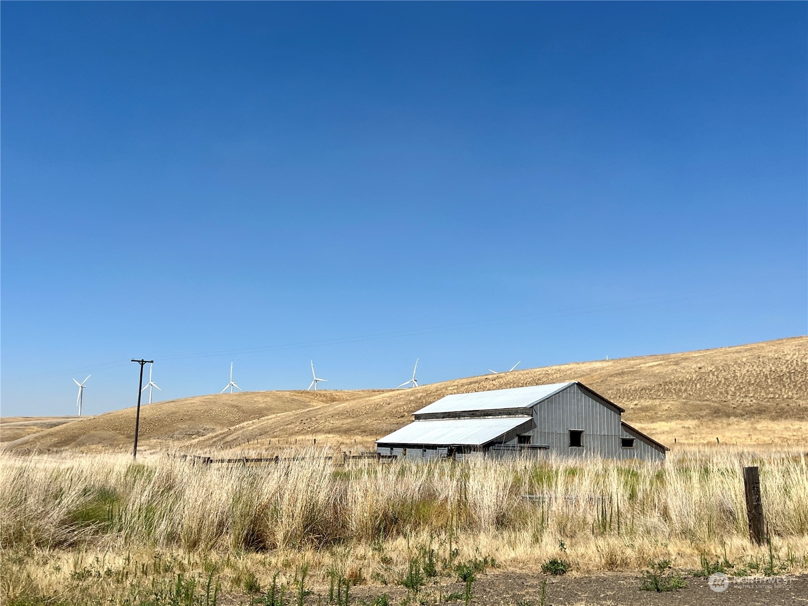 152 Jackson Road Pomeroy, WA 99347 - Photo 31 of 40 a view of a lake and front of a house