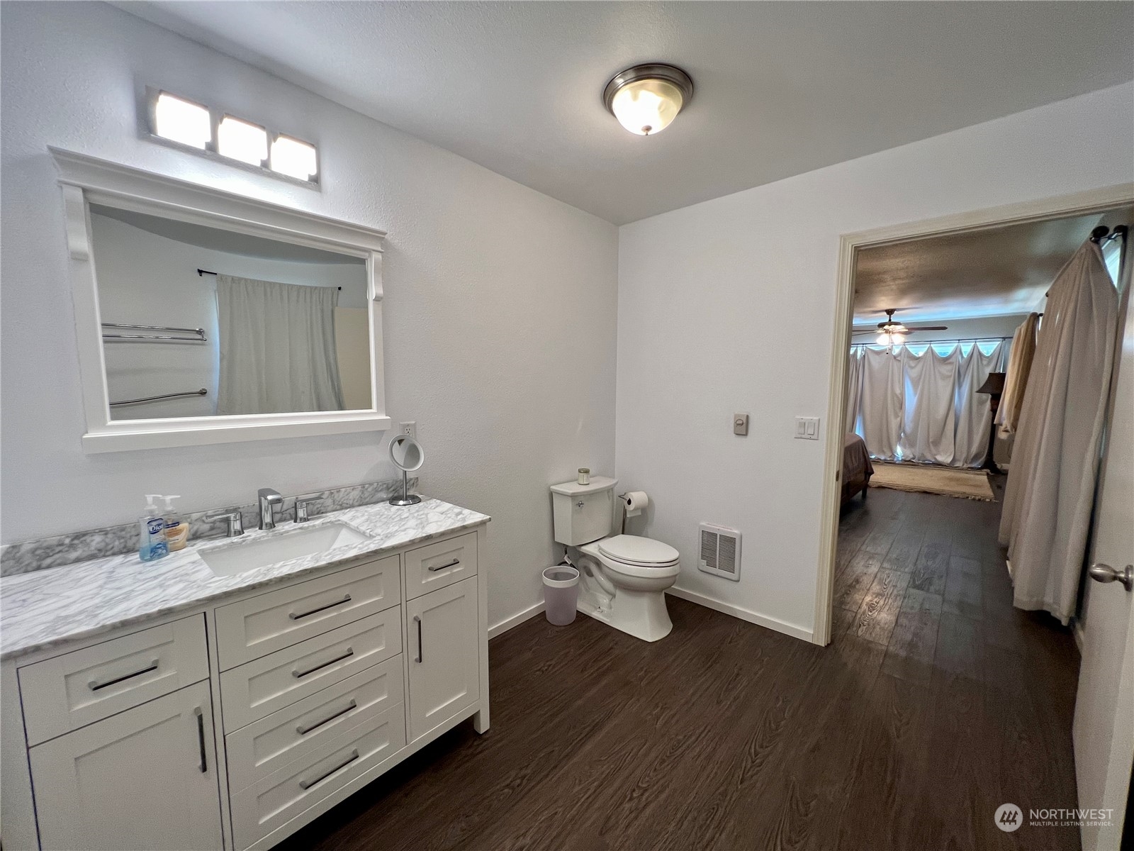 152 Jackson Road Pomeroy, WA 99347 - Photo 8 of 40 a bathroom with a toilet sink and mirror
