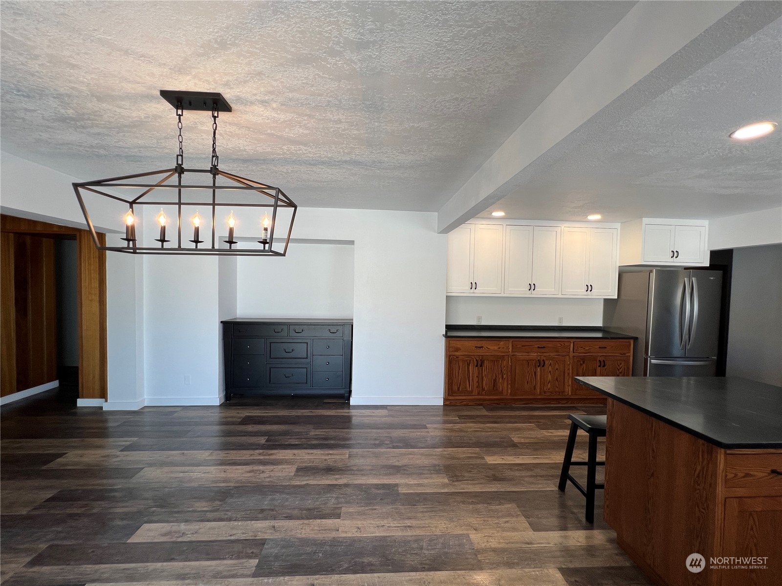 152 Jackson Road Pomeroy, WA 99347 - Photo 10 of 40 a view of kitchen with cabinets and wooden floor