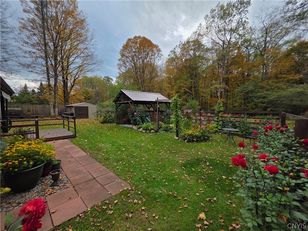 1053 Grant Road Russia, NY 13324 - Photo 28 of 47 Mature trees frame a lush green lawn featuring a c