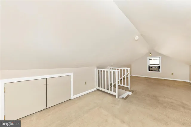 a front view of a house with a empty space