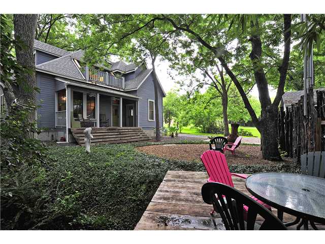 a view of a patio in backyard