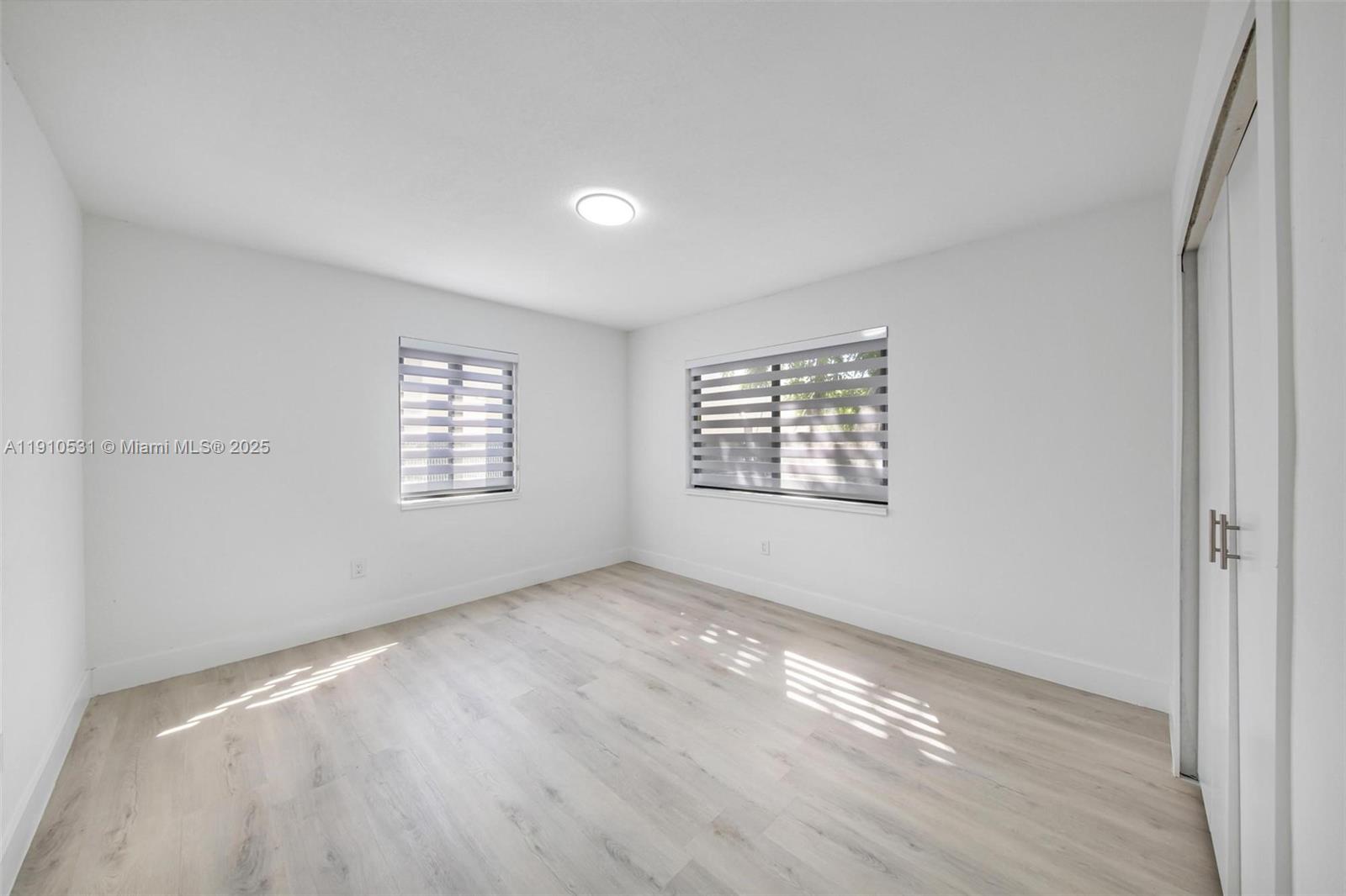 2250 Northwest 95th Street Miami, FL 33147 - Photo 15 of 26 an empty room with windows