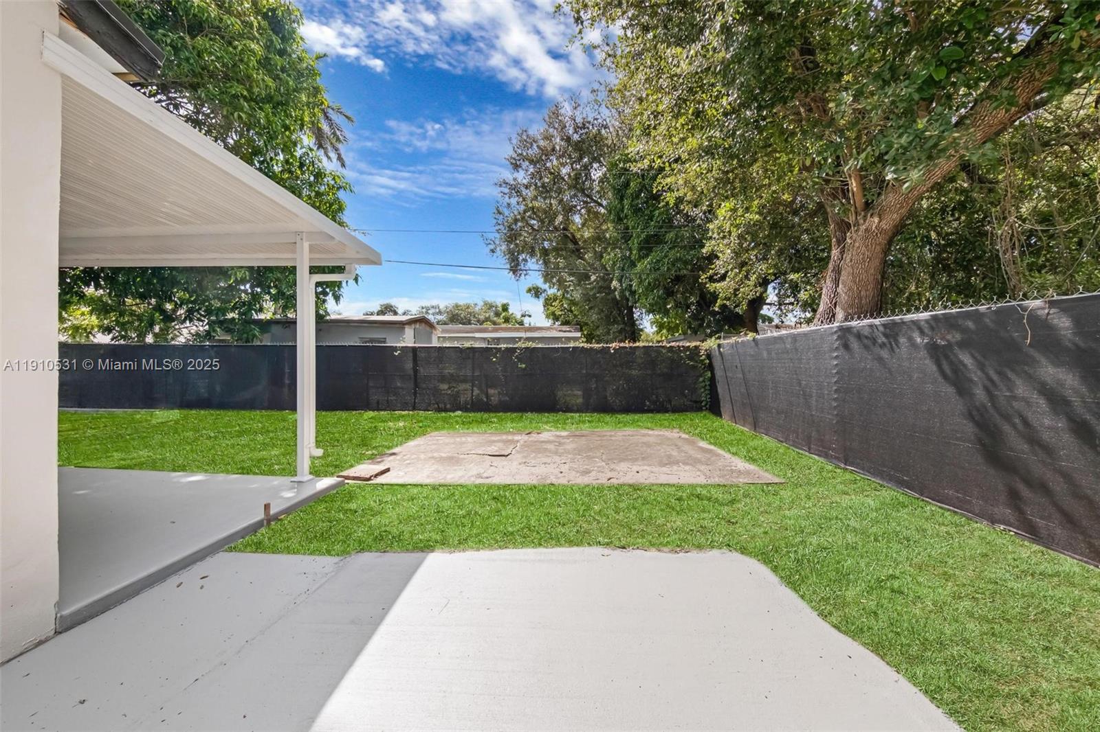 2250 Northwest 95th Street Miami, FL 33147 - Photo 22 of 26 a view of a backyard with a small cabin