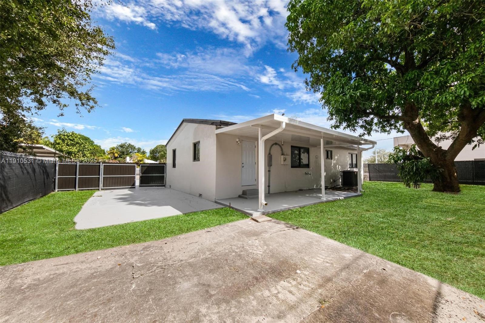 2250 Northwest 95th Street Miami, FL 33147 - Photo 24 of 26 a view of a yard in front of house